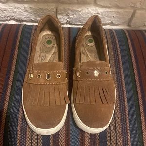 Suede slip on sneakers with jewel and grommet accents.